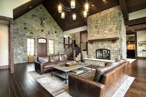 custom home with stonework fireplace